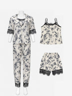 Four-piece floral sleepwear set with button-front top, trousers, camisole and shorts with black lace trim