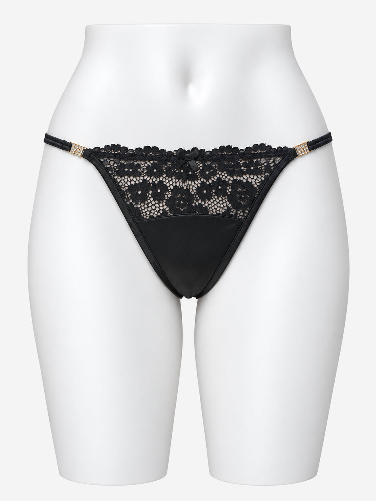 Black floral lace thong on white mannequin, front view