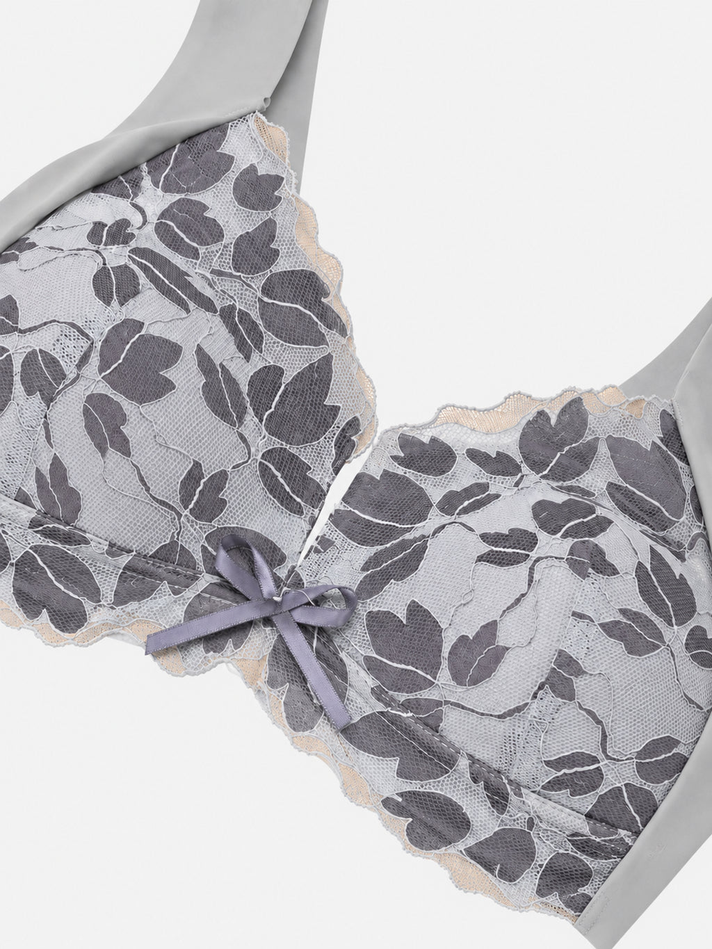 Pink floral lace-look bra on mannequin, front view