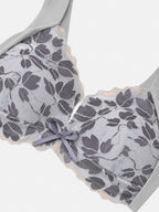 Pink floral lace-look bra on mannequin, front view