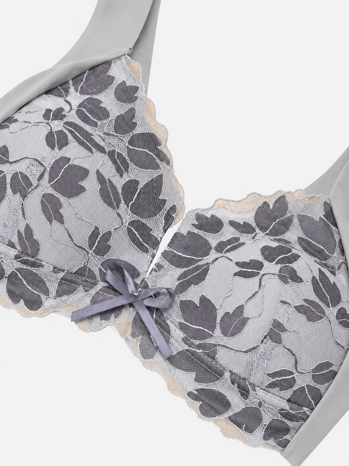 Pink floral lace-look bra on mannequin, front view