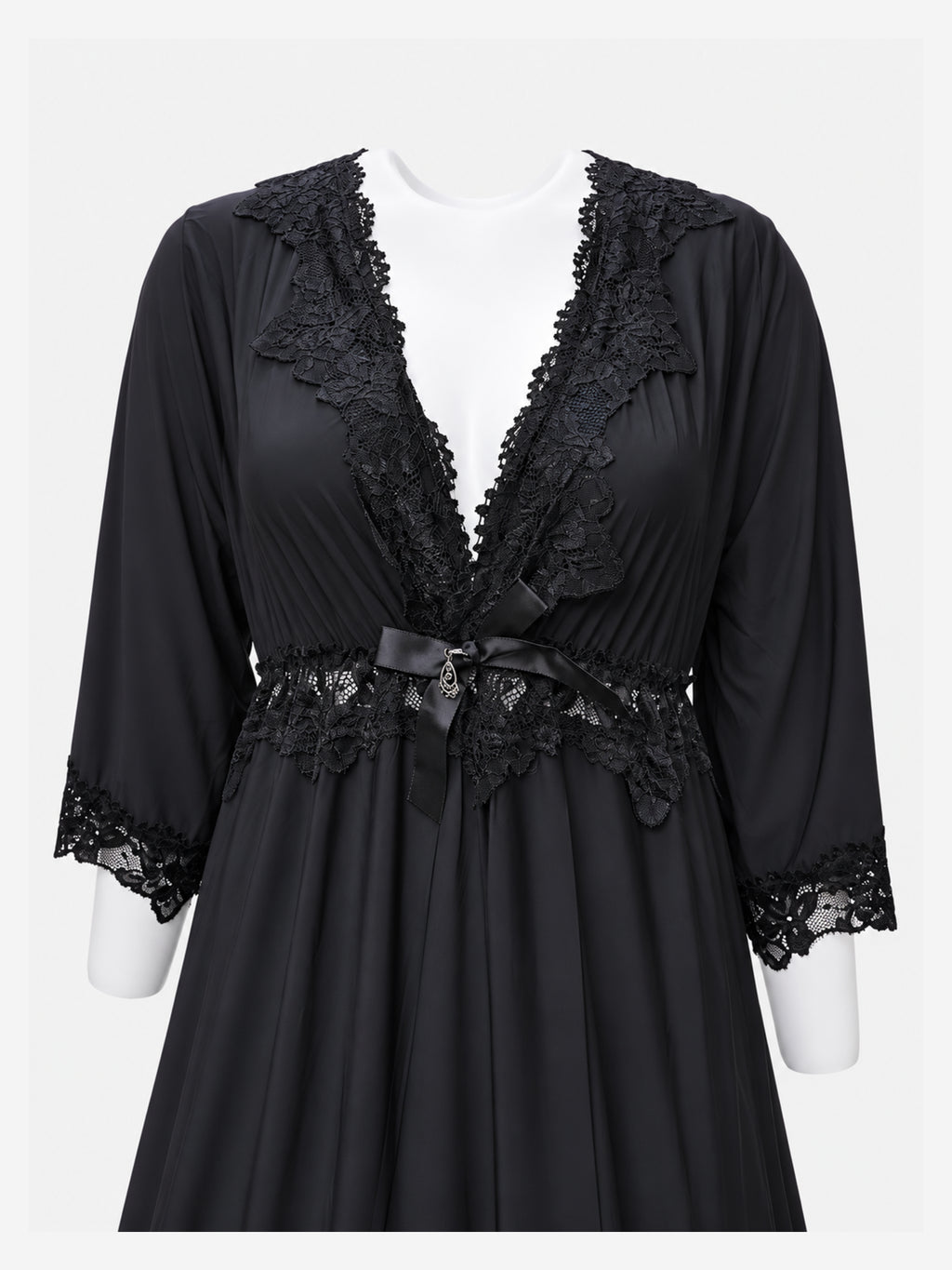 A black long-sleeve sleepwear robe with intricate lace trim along the V-neckline, waist, and cuffs, displayed on a white mannequin torso against a light gray background.
