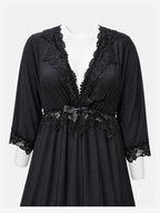 A black long-sleeve sleepwear robe with intricate lace trim along the V-neckline, waist, and cuffs, displayed on a white mannequin torso against a light gray background.