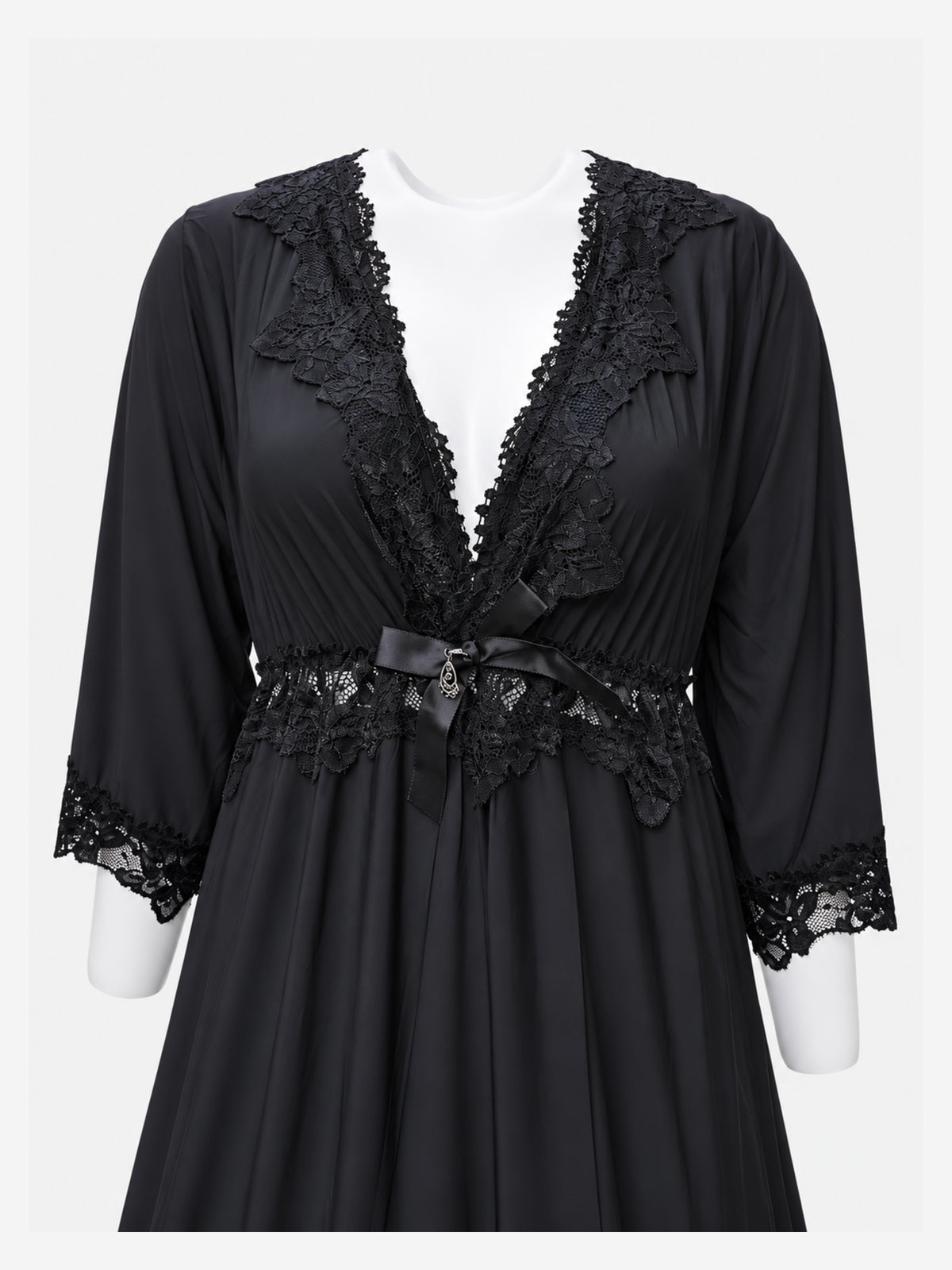 A black long-sleeve sleepwear robe with intricate lace trim along the V-neckline, waist, and cuffs, displayed on a white mannequin torso against a light gray background.