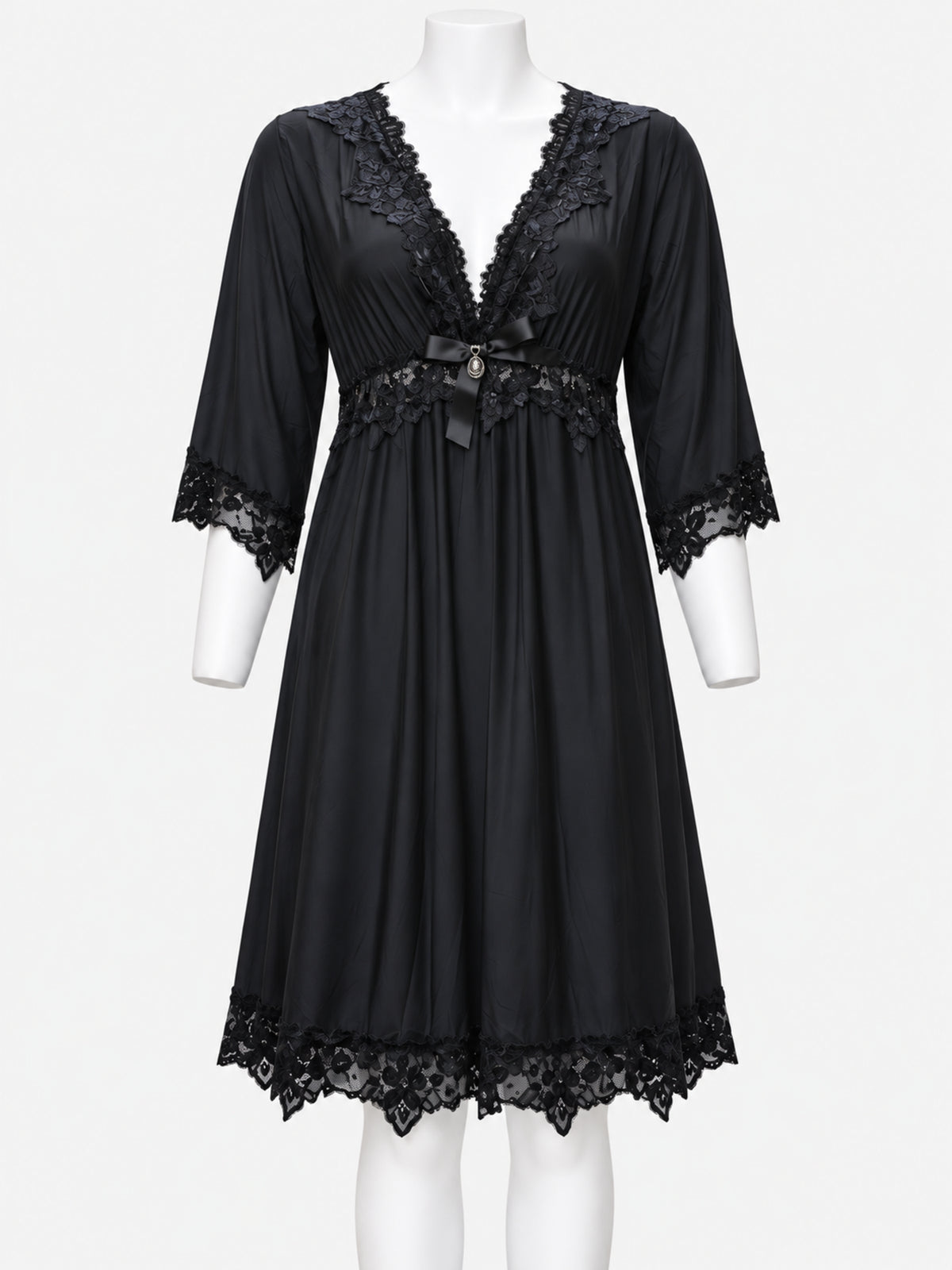 A black sheer nightgown with lace trim on the V-neckline, three-quarter sleeves, and hem, displayed on a white mannequin against a light gray background.
