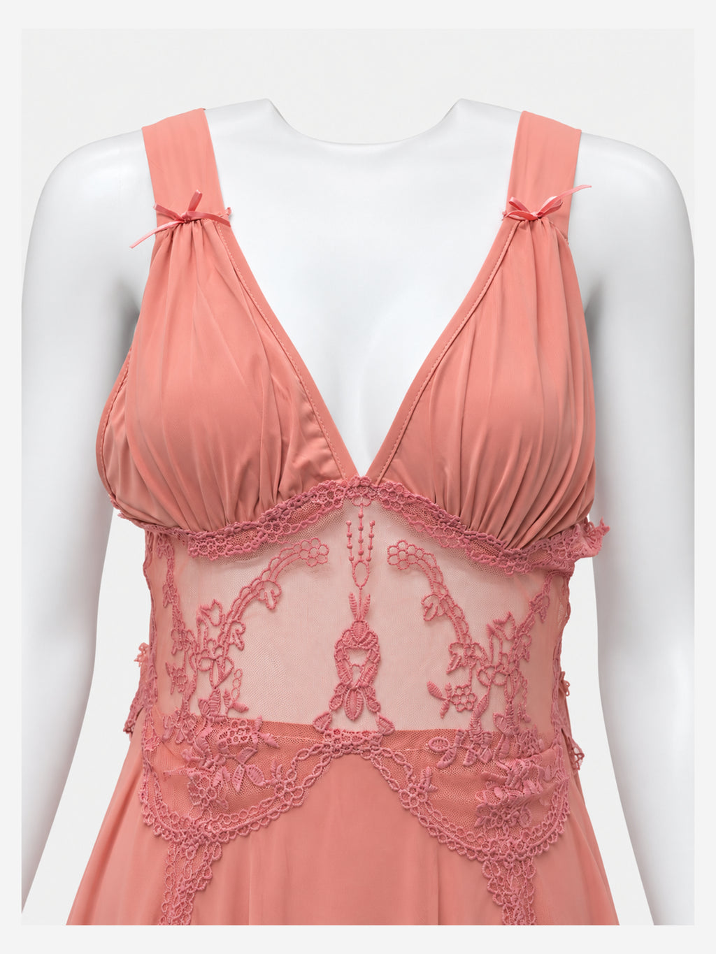 Peach lace nightdress on a white mannequin, front view