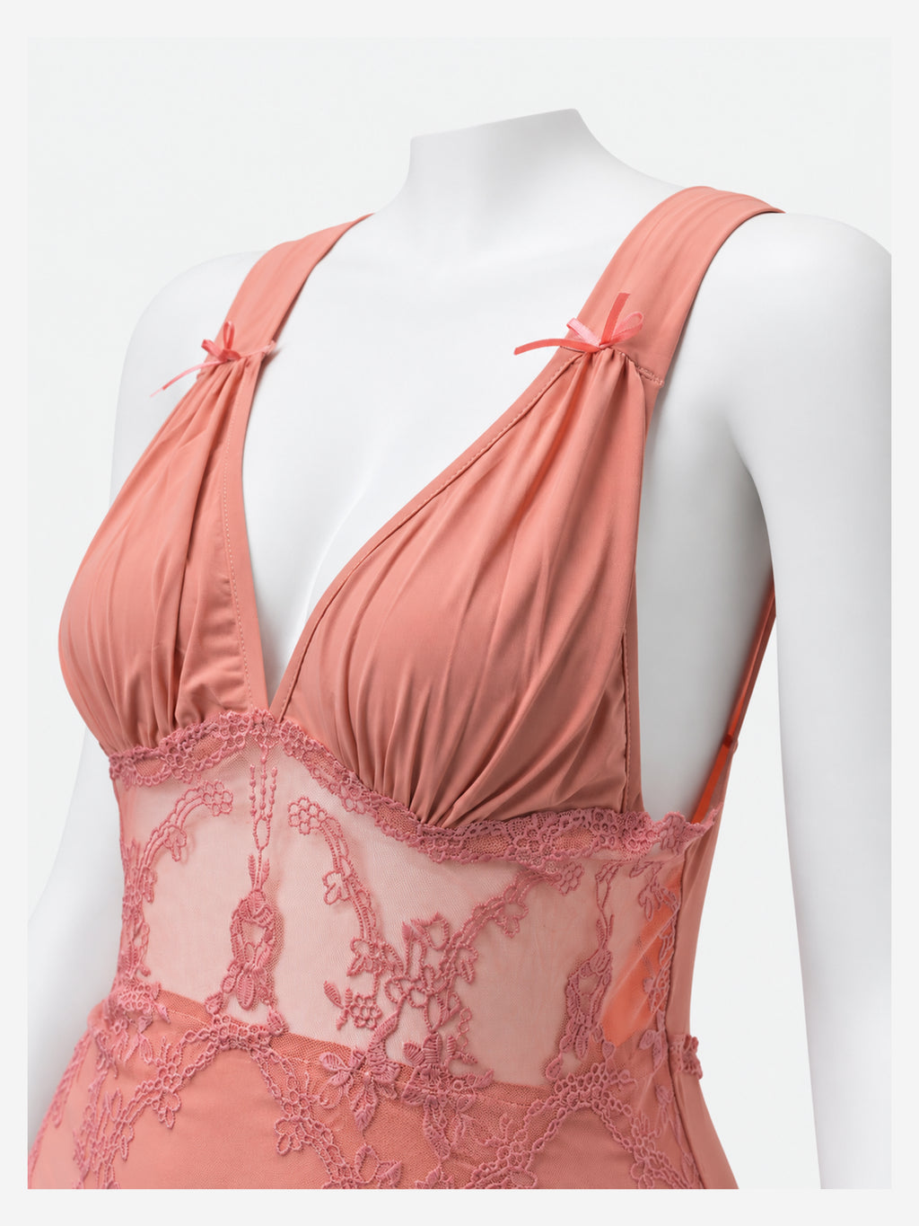 Matching peach thong laid flat, front view