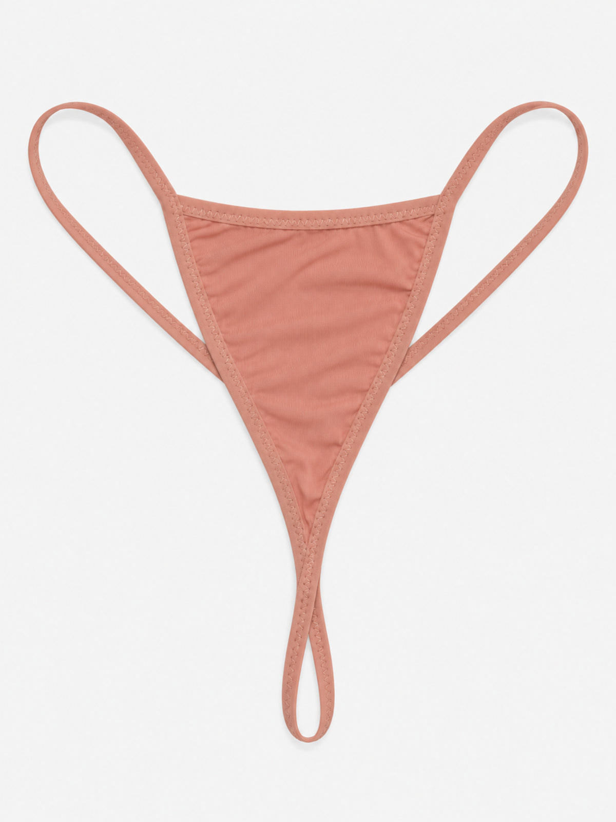 Close-up of peach nightdress neckline, shoulder bows and floral lace waist