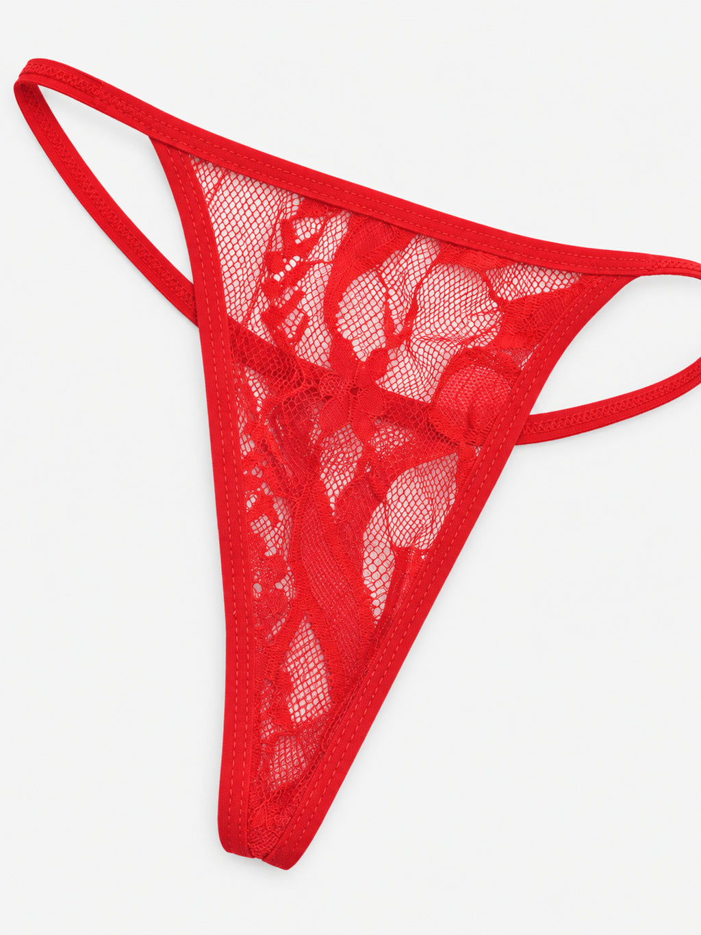 Matching red lace thong laid flat