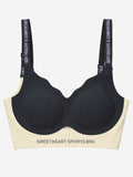 Black sweetheart sports bra with ribbed cups and printed straps, front view